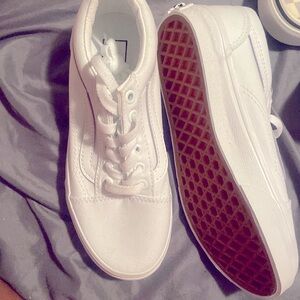 Kids size 2. All white. Never worn